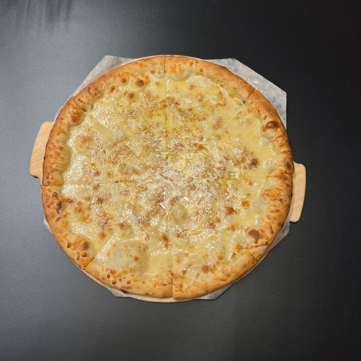 Пицца Четыре сыра 